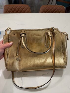 Michael Kors Hayes Large Leather Satchel Gold with snake like textured pattern.